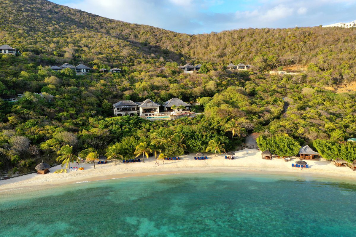 View from ocean of Big Blue Ocean Villa, a beachfront luxury villa in Canouan Island